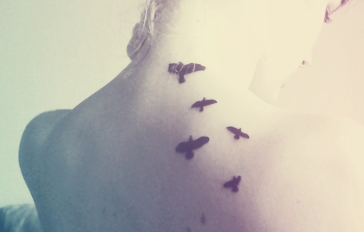 5-black-birds-tattoo-on-back