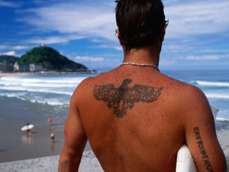 dallas-stribley-tattooed-surfer-looking-at-beach-san-sebastian-spain
