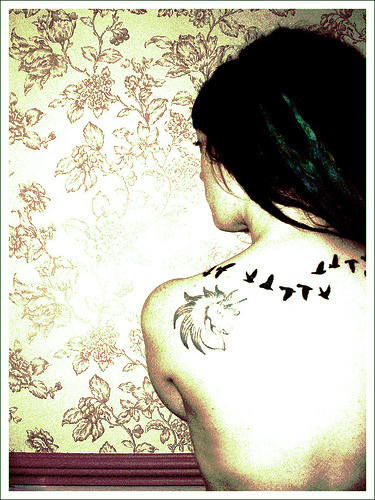 flying-bird-silhouette-tattoo-design