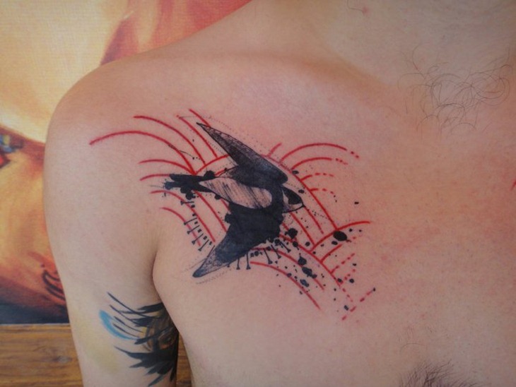 superb-bird-tattoo-design-on-chest