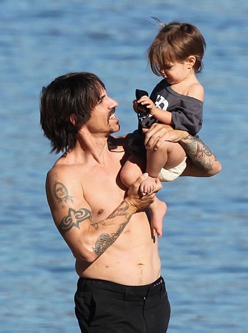 Tattooed daddy Anthony Kiedis bonds with son Everly as the family spends beach time in Malibu