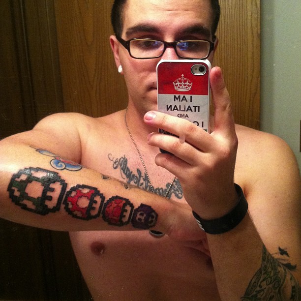 colored-mario-mushroom-tattoos-on-right-arm