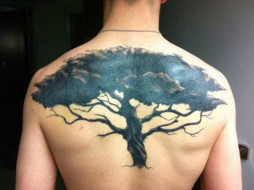 african-tree-tattoo-on-man-back