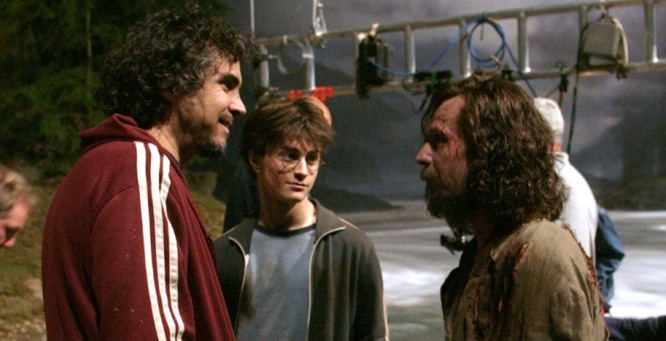 Cuarón com Daniel Radcliff e Gary Oldman no set de O Prisioneiro de Azkaban