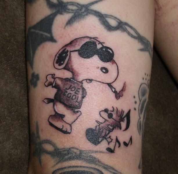 tattoo-arm-snoopy