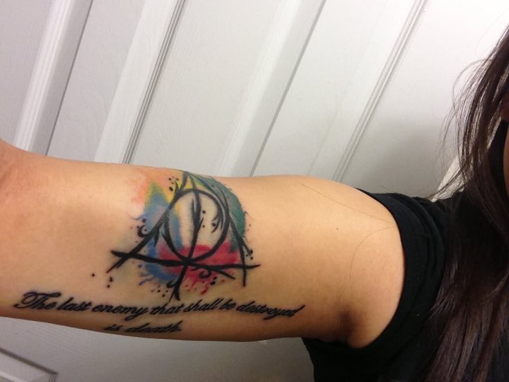 color-deathly-hallows-tattoo-on-sleeve